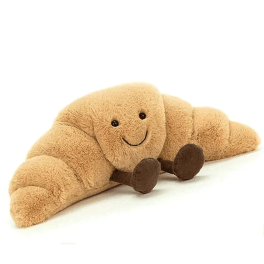 Baguette plush toy positioned as decorative accent piece with whimsical bread character design