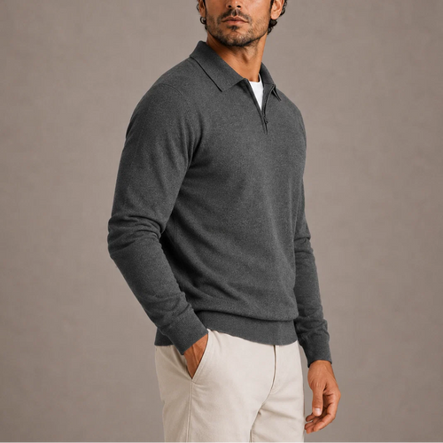 Close-up of men's quarter-zip knit jumper showing smooth knit texture and polo-style collar detail