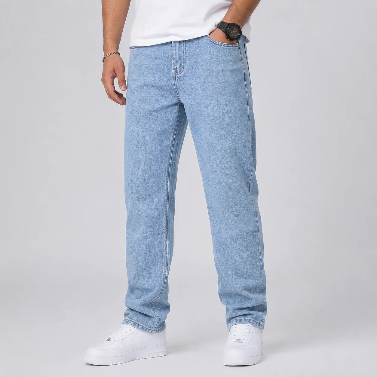 Detail of men's wide leg jeans showing structured denim fabric and straight leg cut