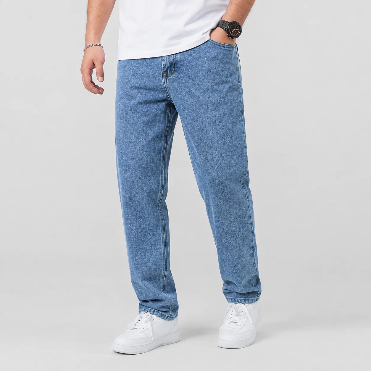 Men's light blue wide leg jeans paired with casual white t-shirt for everyday wear