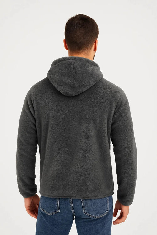 Close-up of men's fleece hoodie showing plush textured fabric and full-length zip closure detail
