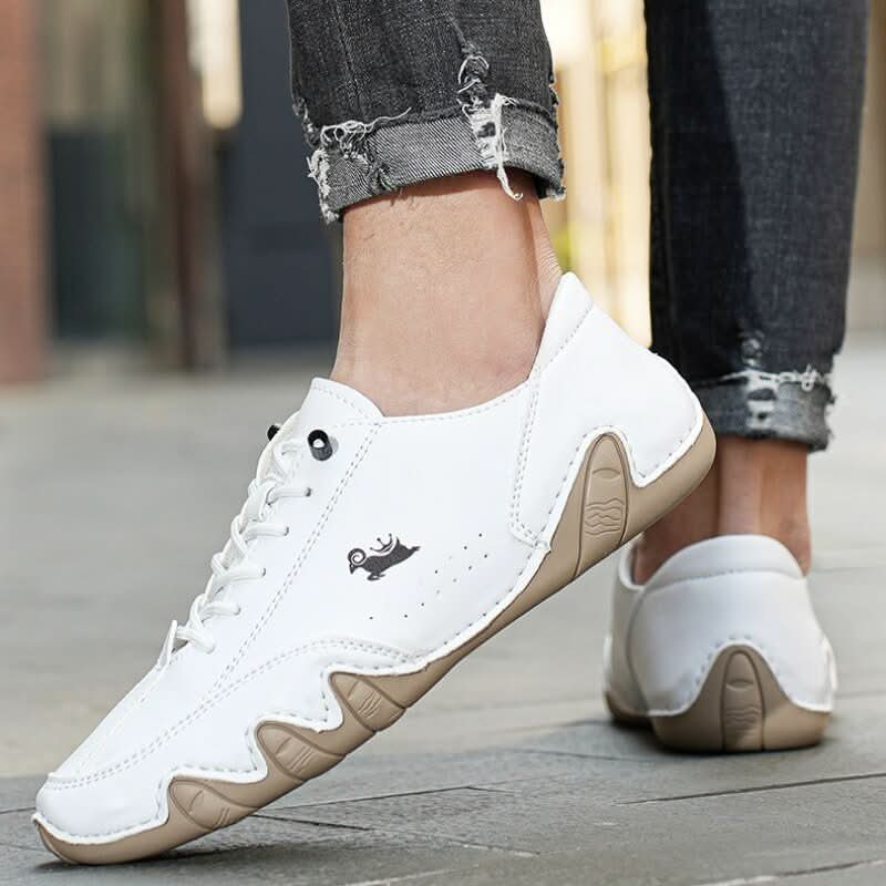 Close-up of men's casual trainer featuring textured outsole and supportive lace-up fit