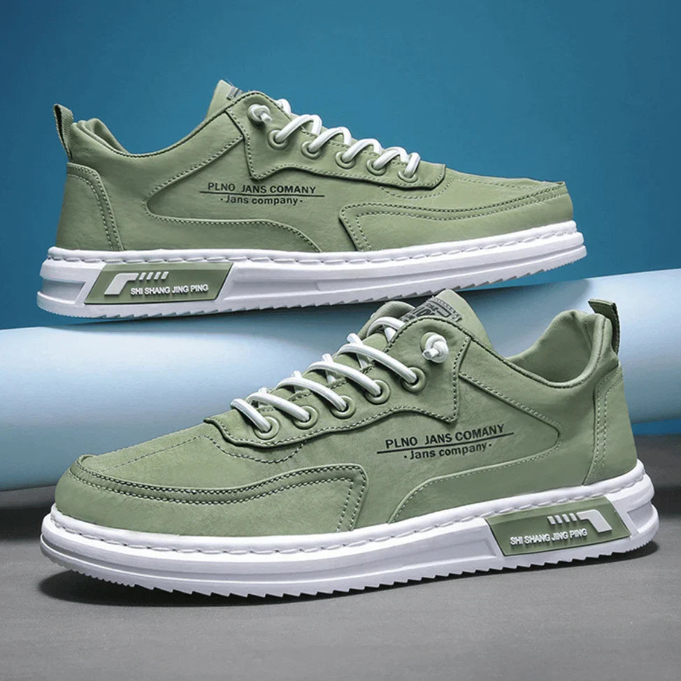 Men's lace-up trainers in sage green with white sole and graphic side panel details