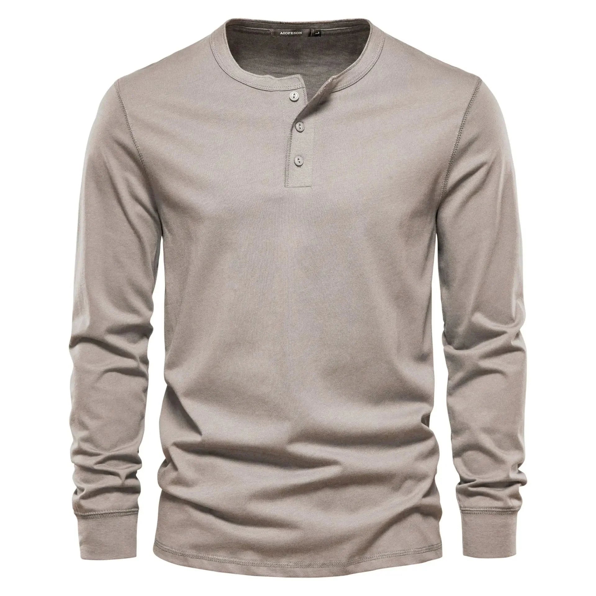 Close-up view of men's henley showing three-button neckline and ribbed collar detail