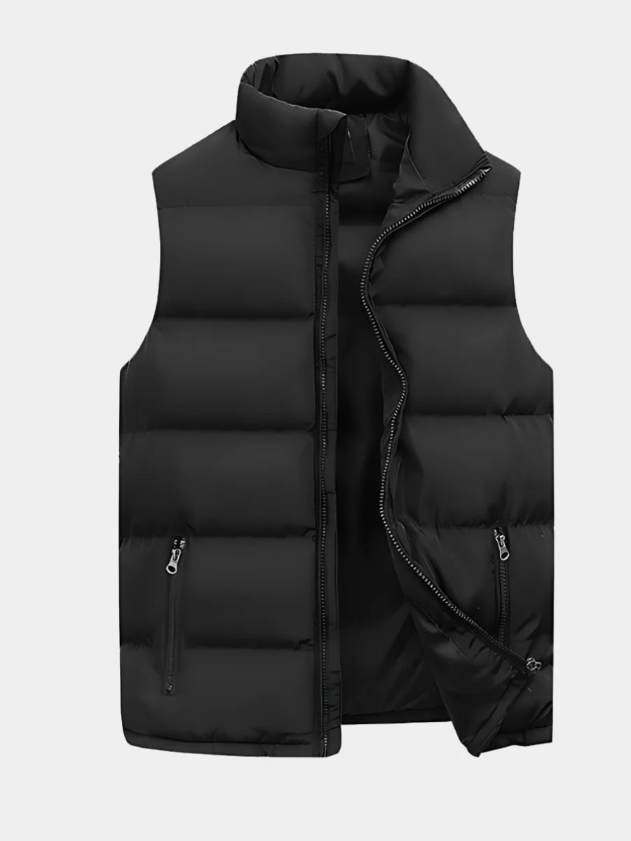 Men's quilted gilet in black with padded construction, stand collar, and zip pockets for everyday layering
