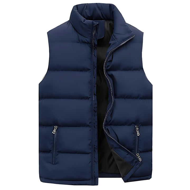 Side angle of men's padded gilet displaying armhole cut and structured quilted panels