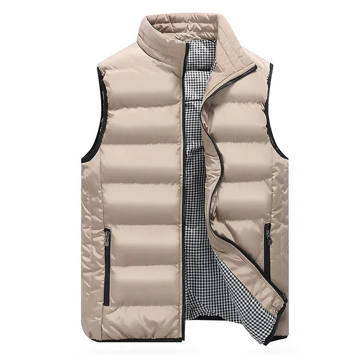 Detail shot of men's gilet zip pocket and quilted outer shell finish