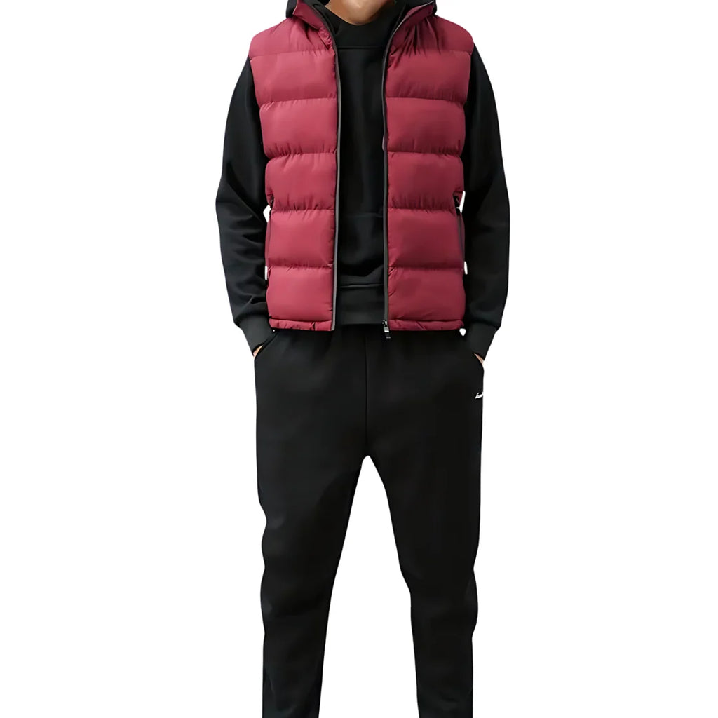 Men's black padded gilet showing regular fit and layering design over casual wear