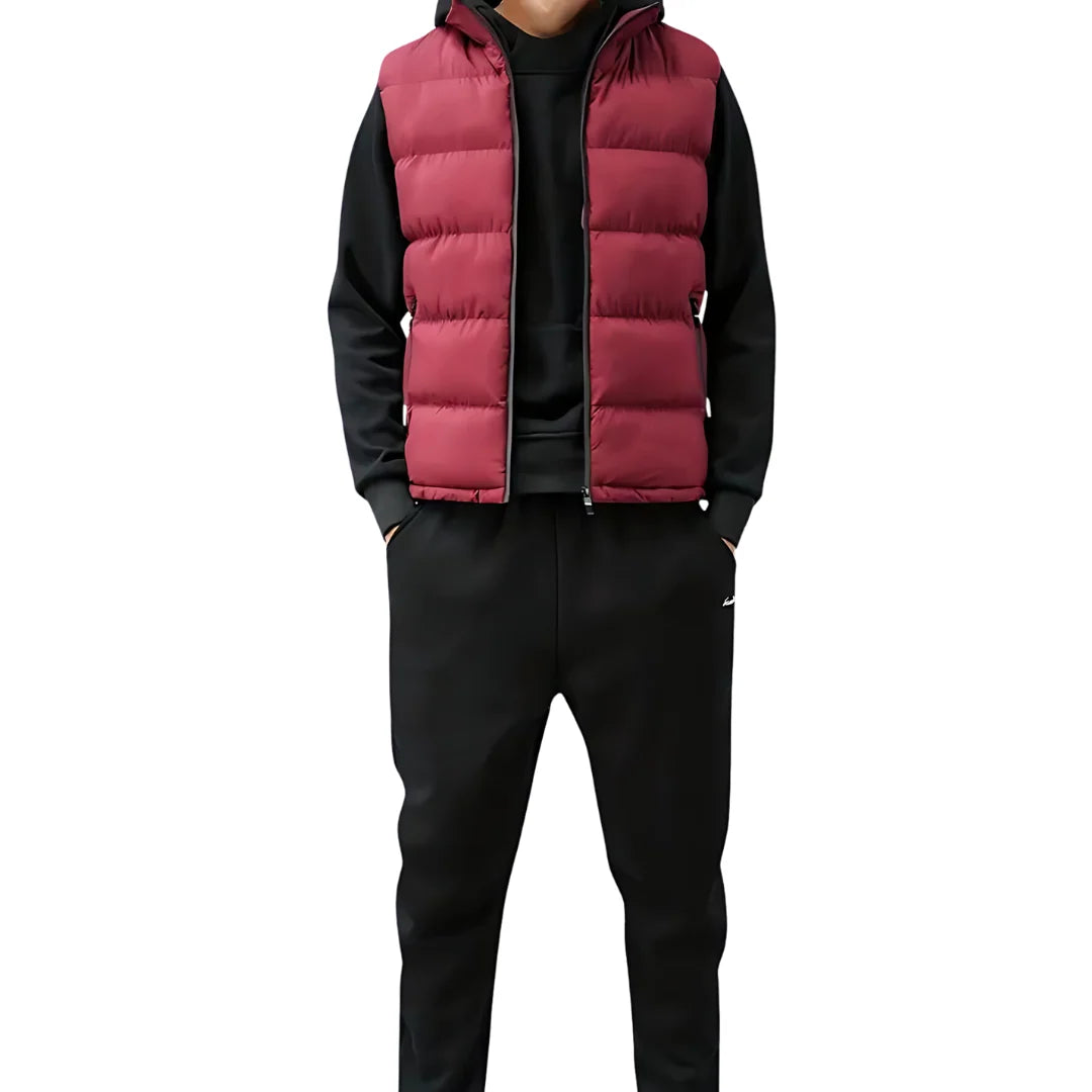 Men's black padded gilet showing regular fit and layering design over casual wear