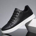 Side view of men's trainers showing clean low-top silhouette and structured upper