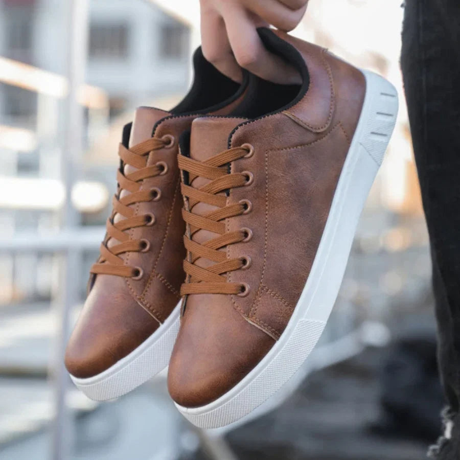 Rear view of men's low-top trainers with contrasting white textured sole