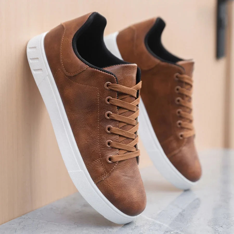 Men's trainers on flat surface displaying versatile casual footwear silhouette