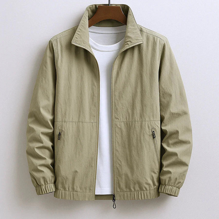Side view of men's zip-up jacket highlighting relaxed fit and side zip pocket