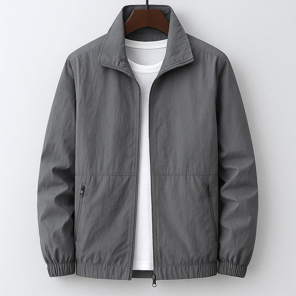 Detail shot of men's jacket zip pocket and woven fabric construction