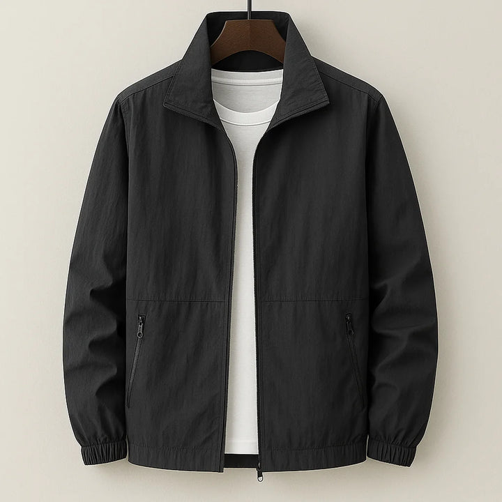 Men's navy casual jacket displayed flat showing relaxed silhouette and design features