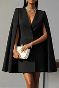 Model wearing powder blue cape mini dress with white clutch bag for formal occasion