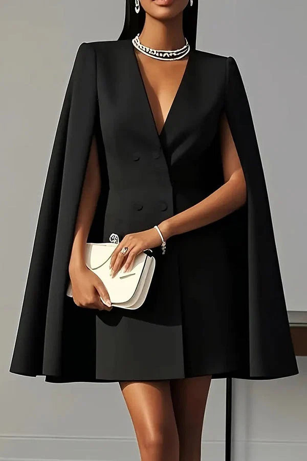 Model wearing powder blue cape mini dress with white clutch bag for formal occasion