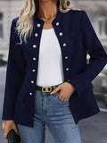 Women's navy double-breasted blazer with silver buttons and open front worn over white tee