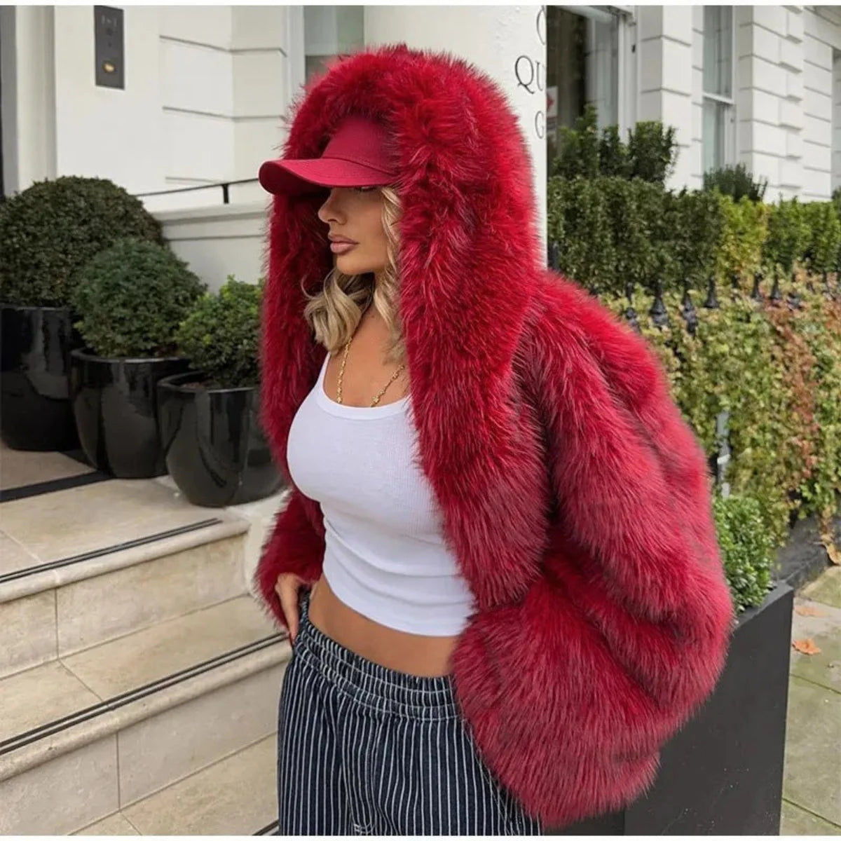 Women's open-front coat with statement hood and cocooning shape in bold colour