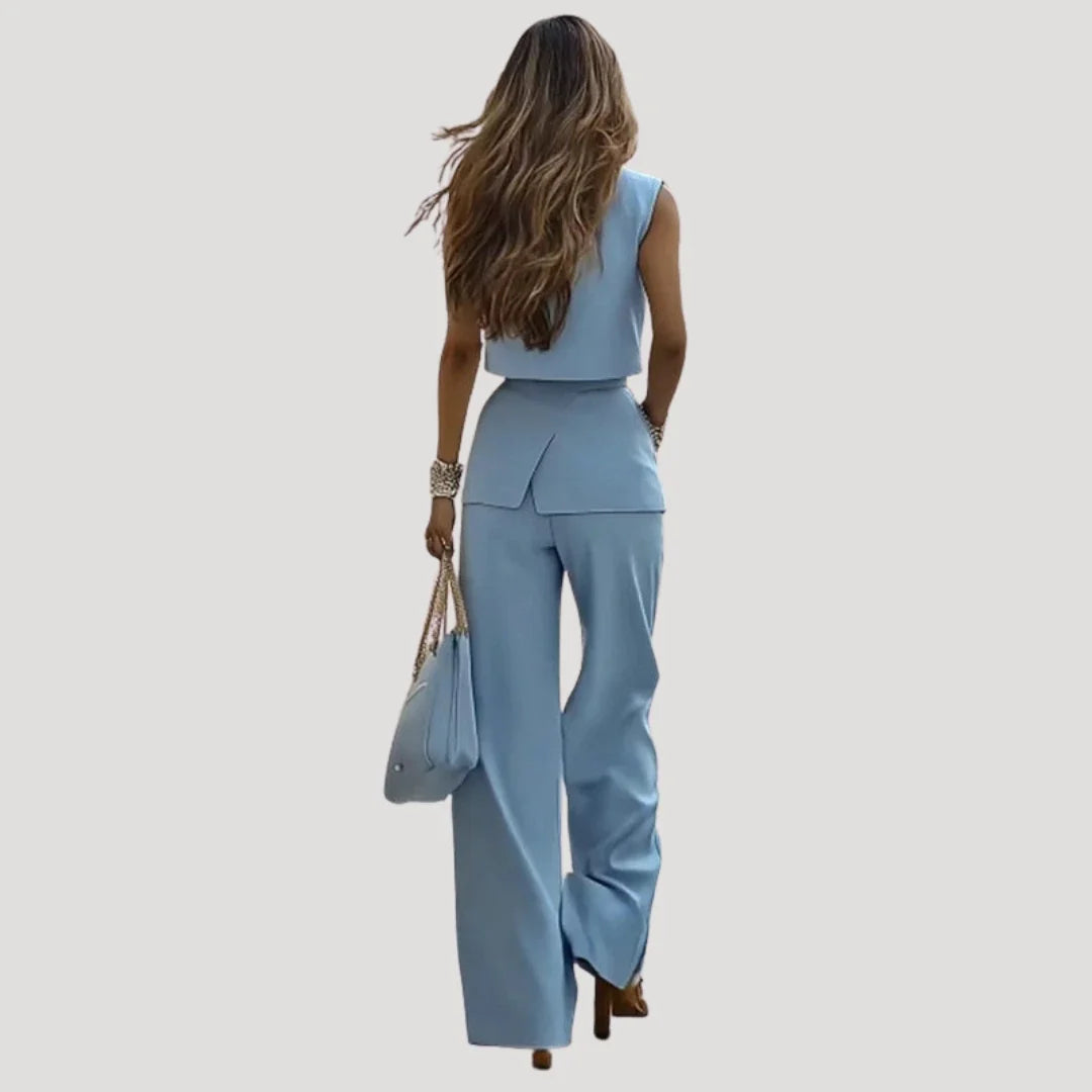 Wide-leg trouser suit set with sleeveless blazer showing structured silhouette and clean lines