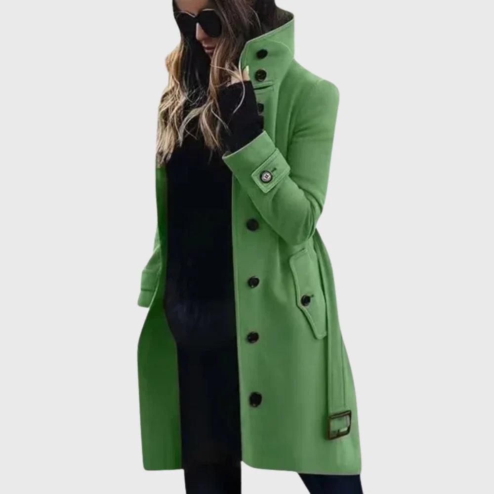 Full length view of women's button front trench coat extending below hips