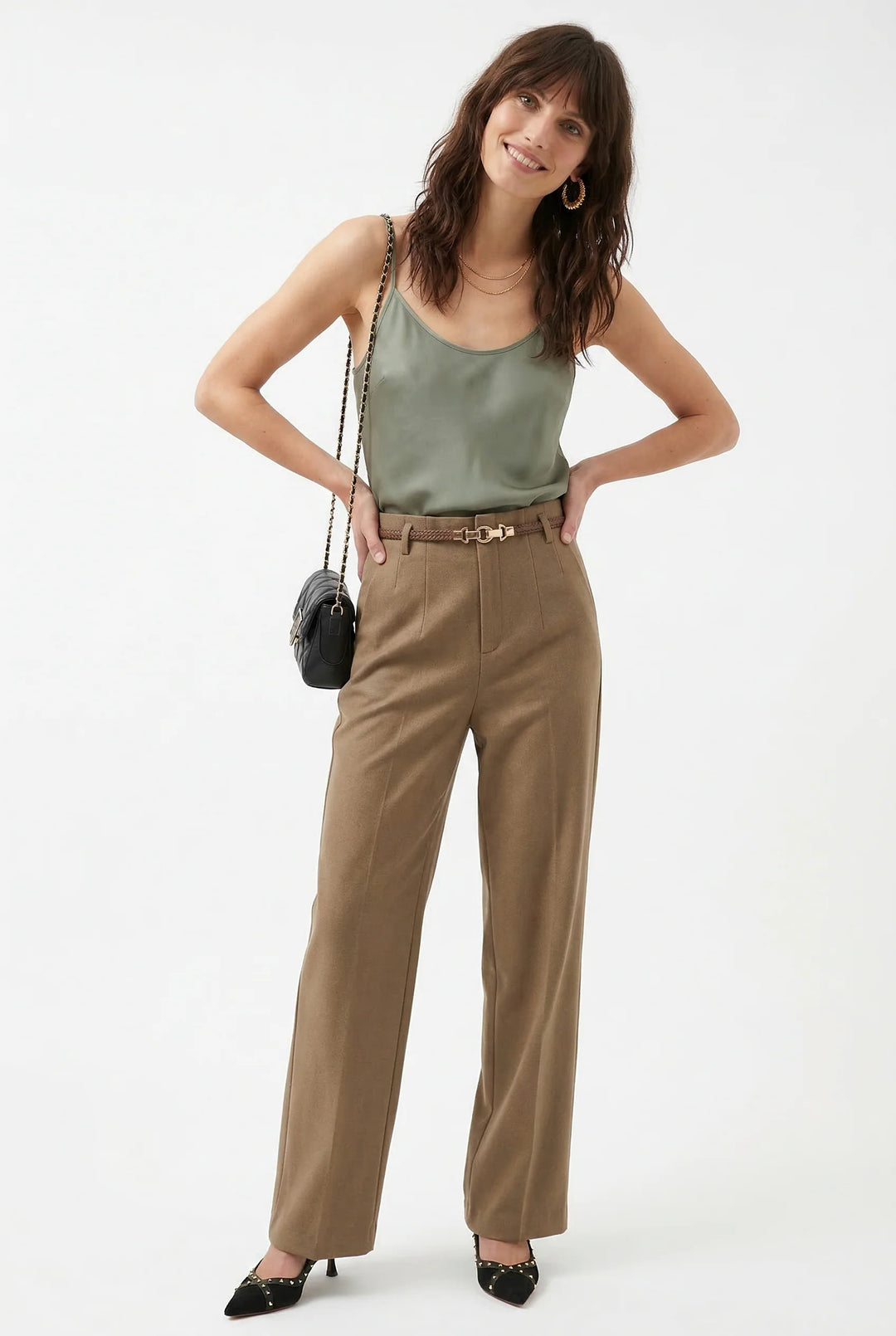 Side profile of wide leg wool trousers showing full length and crisp tailoring
