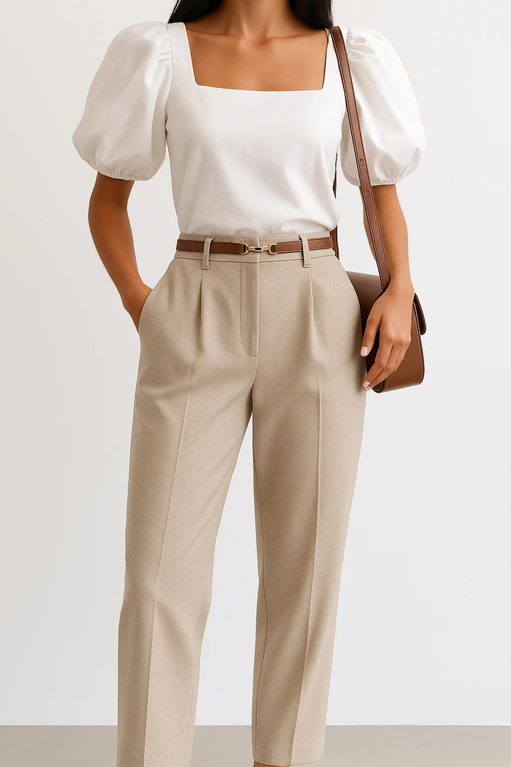 Women's wide leg wool trousers in beige paired with black accessories