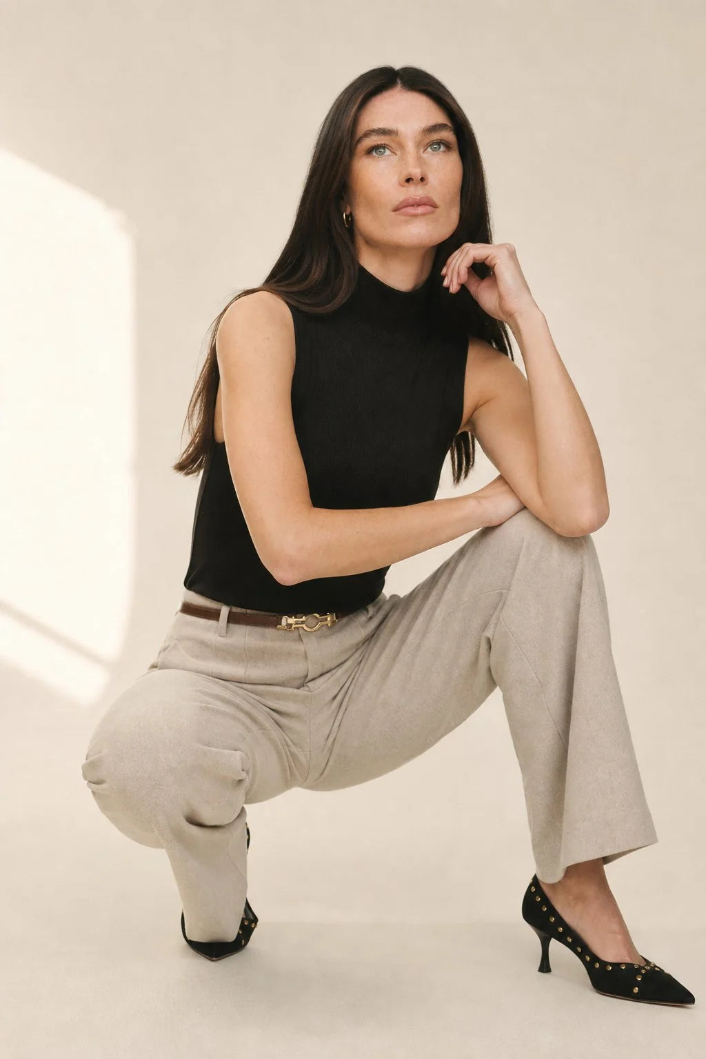Women's wool trousers in beige with wide leg cut styled for office wear