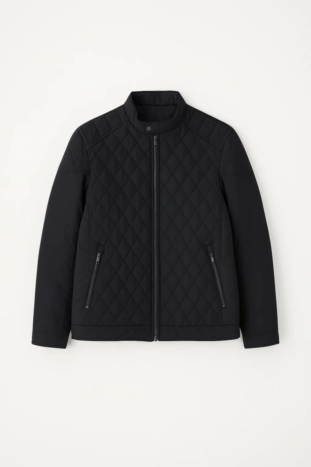 Close-up of men's quilted jacket showing diamond stitch pattern and full zip closure detail
