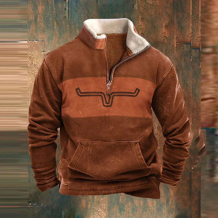 Close-up view of men's fleece pullover showing quarter-zip closure and contrast stitching detail