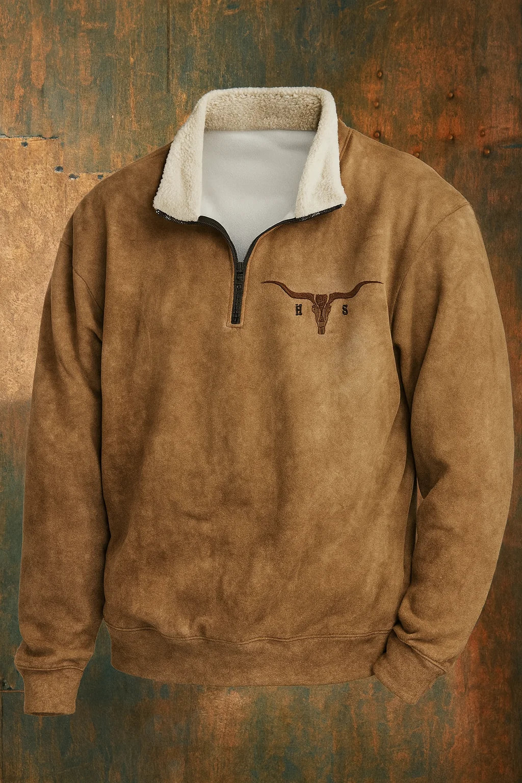 Detail shot of sherpa-lined stand collar and quarter-zip hardware on men's pullover