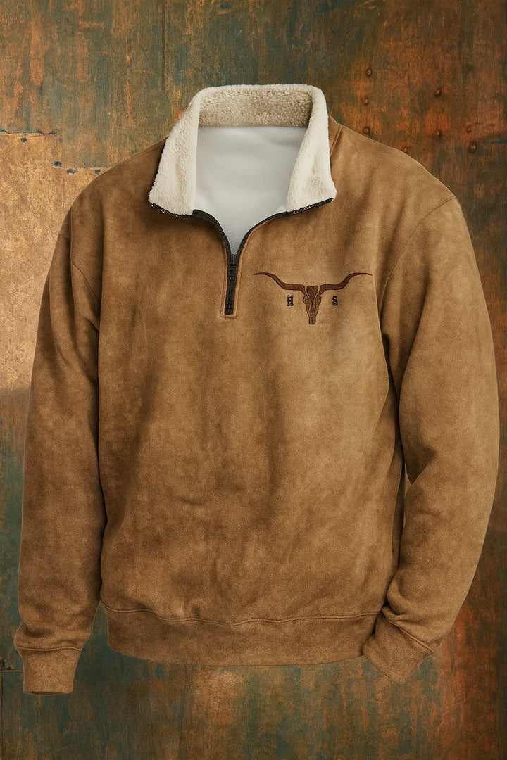 Detail shot of sherpa-lined stand collar and quarter-zip hardware on men's pullover