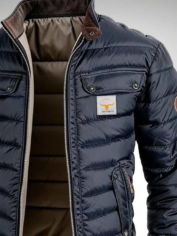 Back view of navy quilted puffer jacket with ribbed hem detail