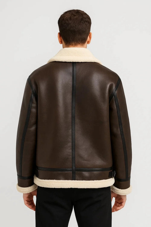 Close-up view of men's aviator jacket showing shearling lining and structured silhouette detail