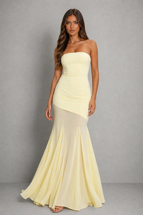 Close-up view of strapless neckline and fitted bodice on maxi dress