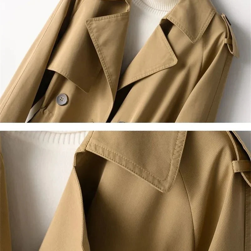 Full-length view of sage green trench coat showing mid-length hemline and structured drape