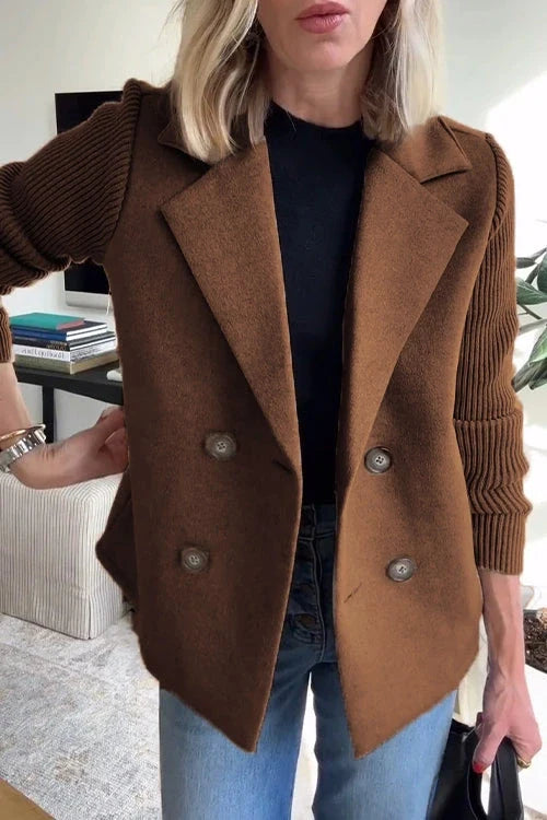 Women's camel knit blazer styled for office wear over black top