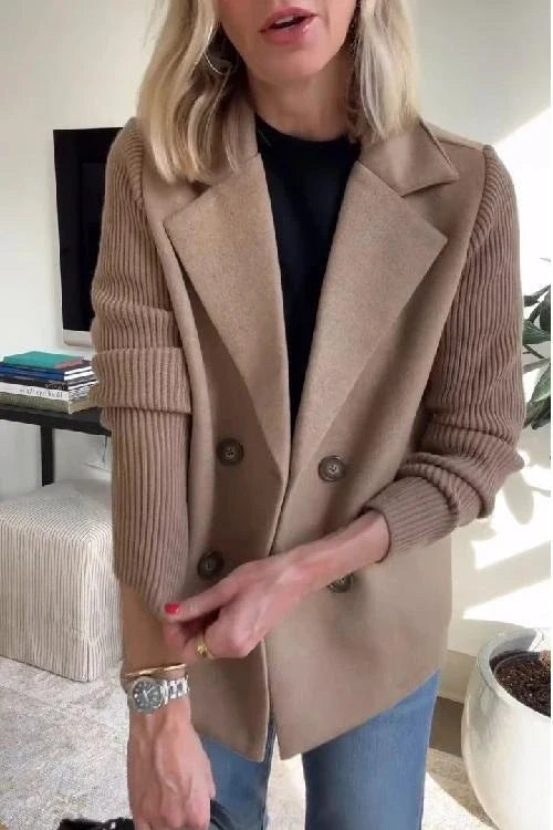Close-up of knit double-breasted blazer showing notched lapels and button detail
