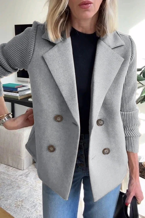 Full-length view of knit double-breasted blazer paired with jeans
