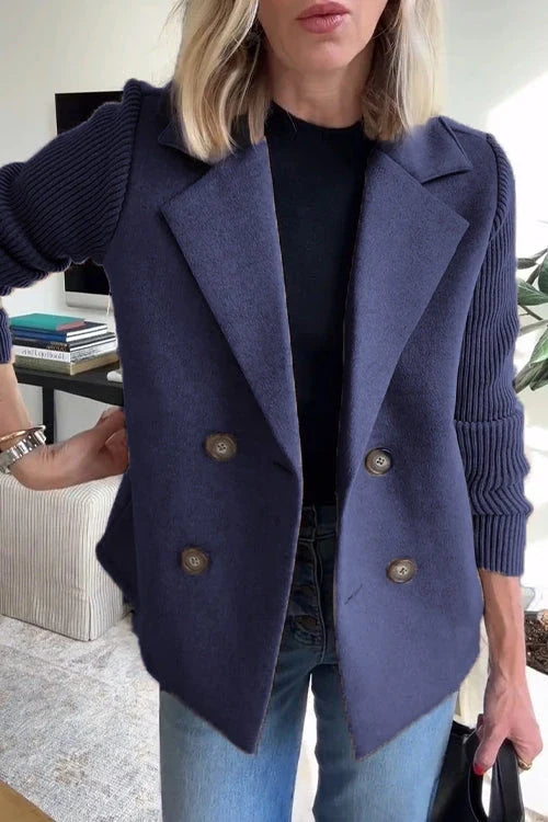 Close-up of blazer lapel and shoulder structure in soft knit fabric