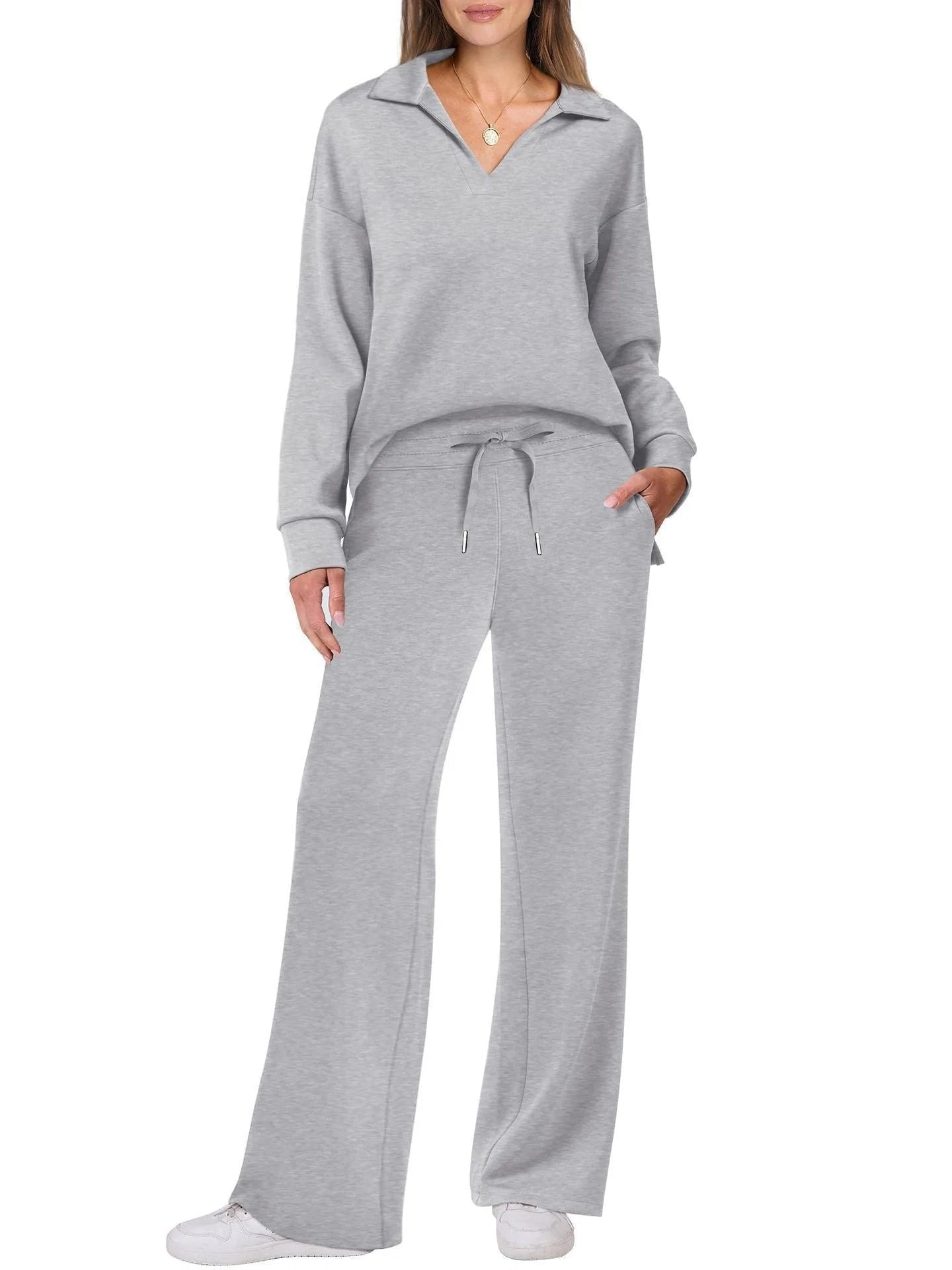 Women's two-piece lounge set featuring coordinated top and trousers with adjustable waist for personalised fit