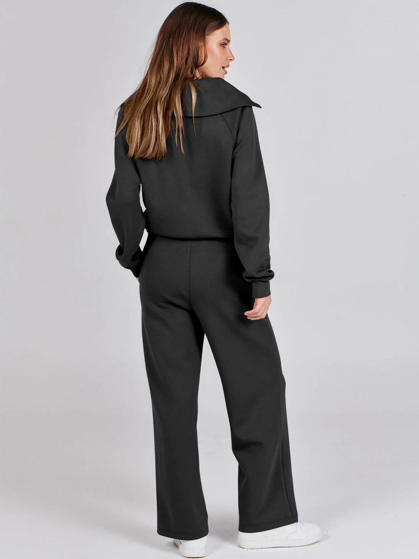 Detail view of women's lounge set drawstring waist and wide-leg trouser construction