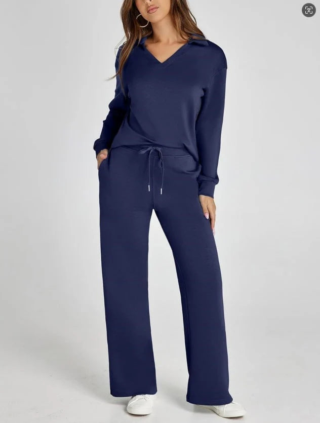 Women's lounge set styled casually with V-neck top tucked into wide-leg trousers for coordinated look