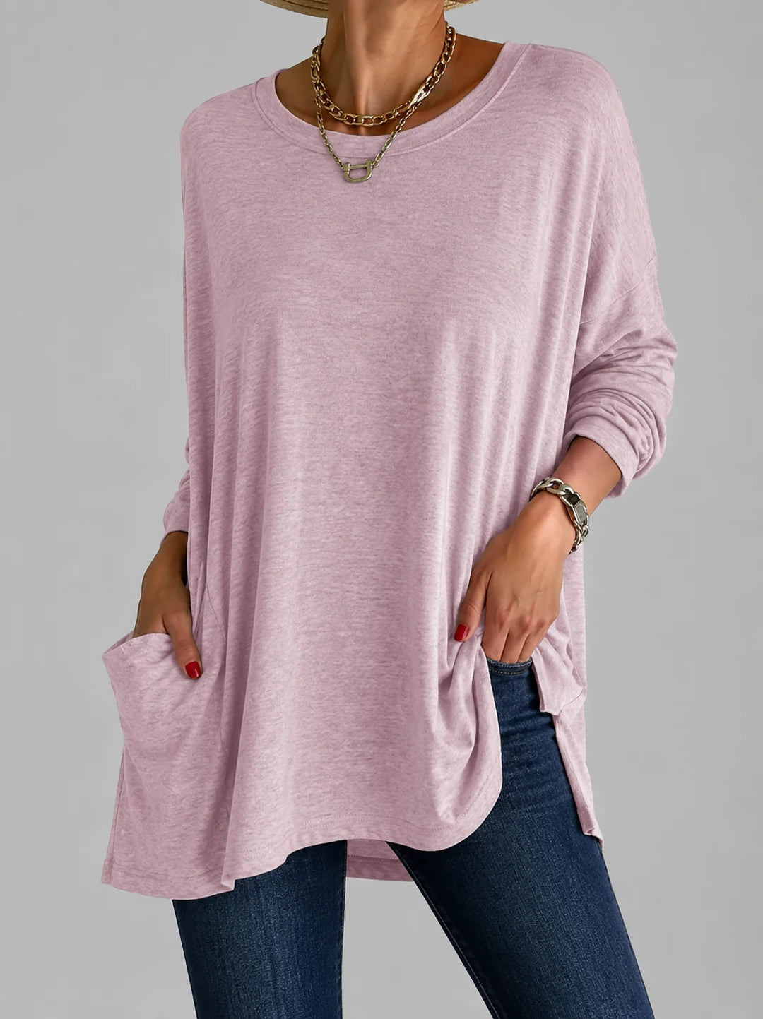 Women's oversized tunic top in burgundy with round neck and practical front pockets for everyday wear