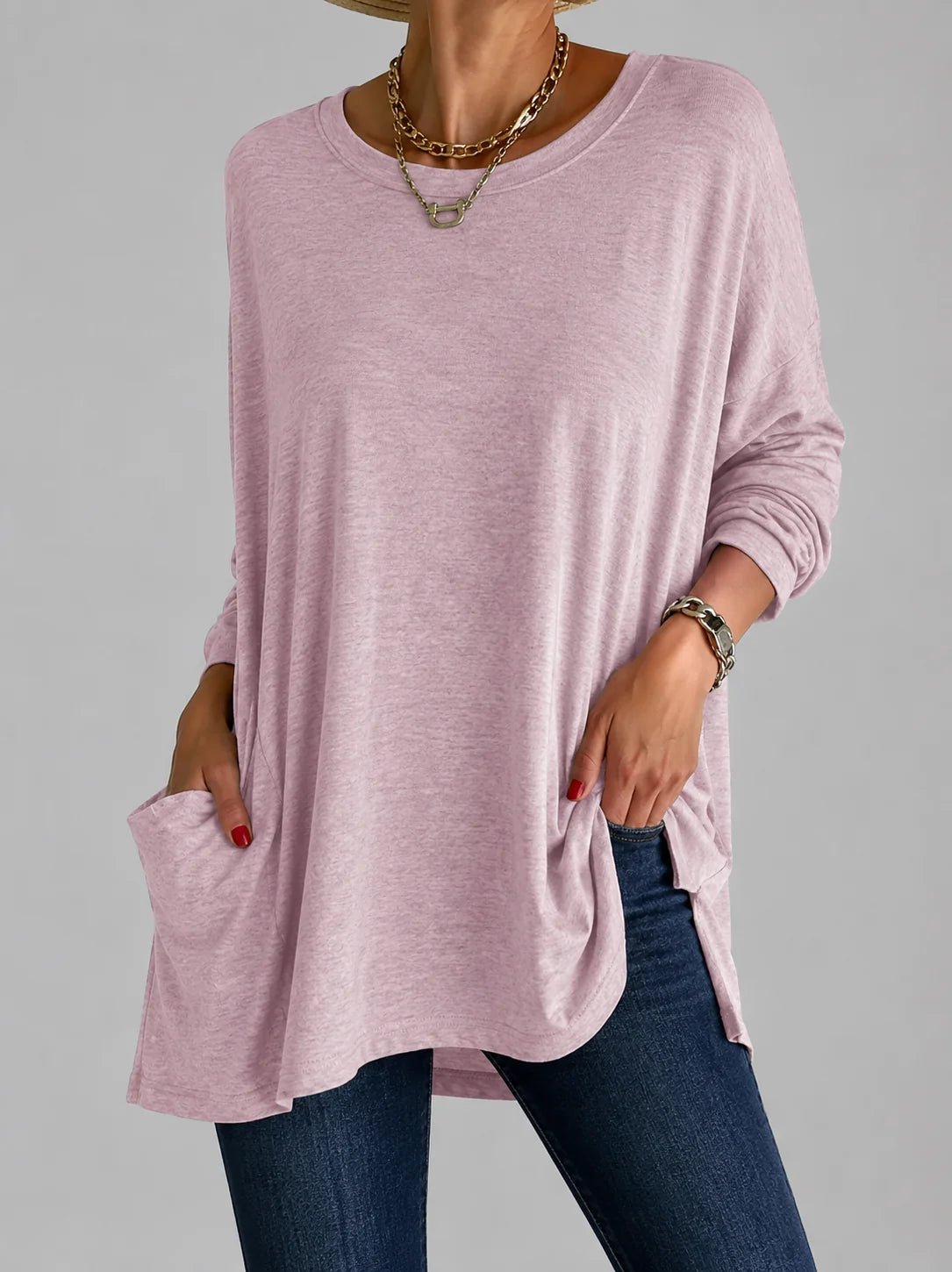 Women's oversized tunic top in burgundy with round neck and practical front pockets for everyday wear