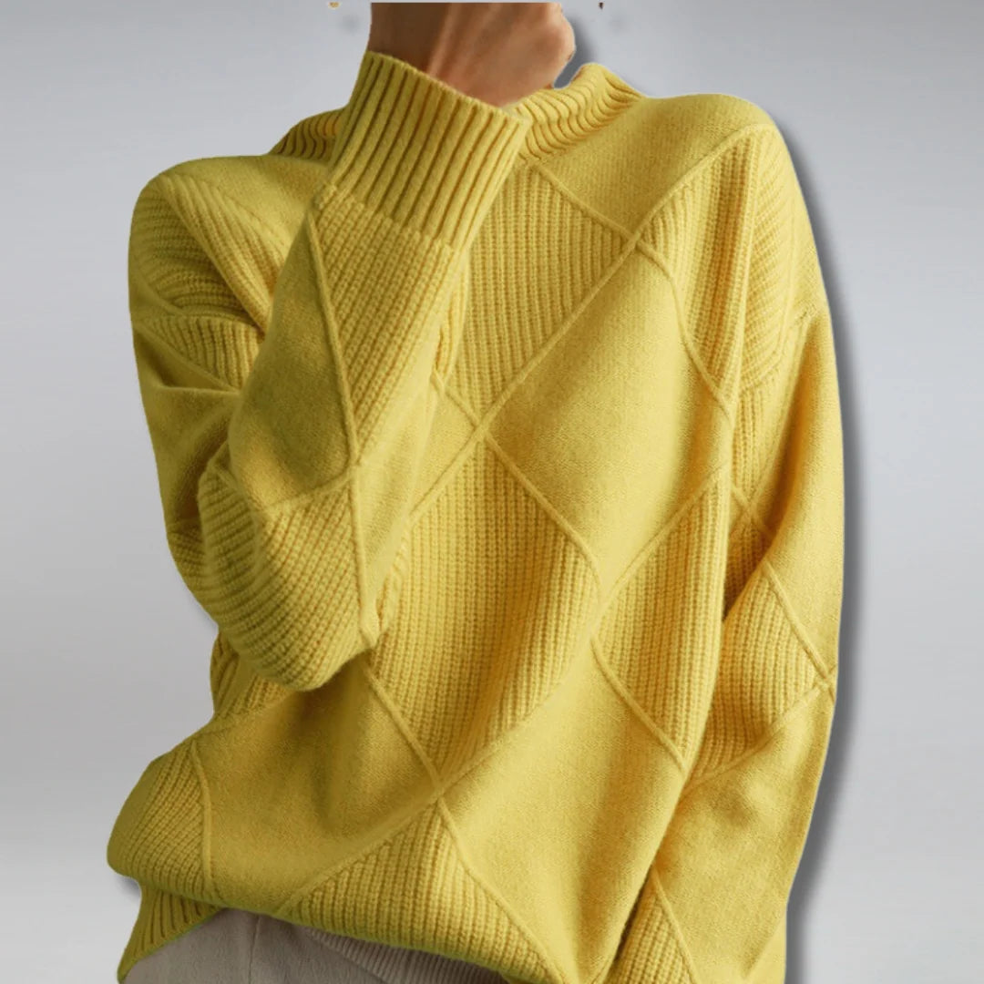 Side view of women's turtleneck jumper displaying drop shoulder sleeves and relaxed drape
