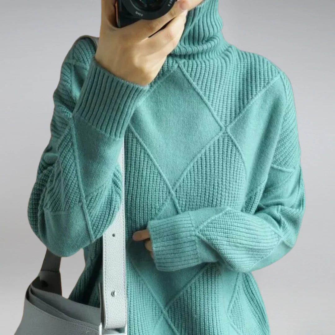 Detail shot of women's turtleneck jumper ribbed cuffs and soft knit fabric texture