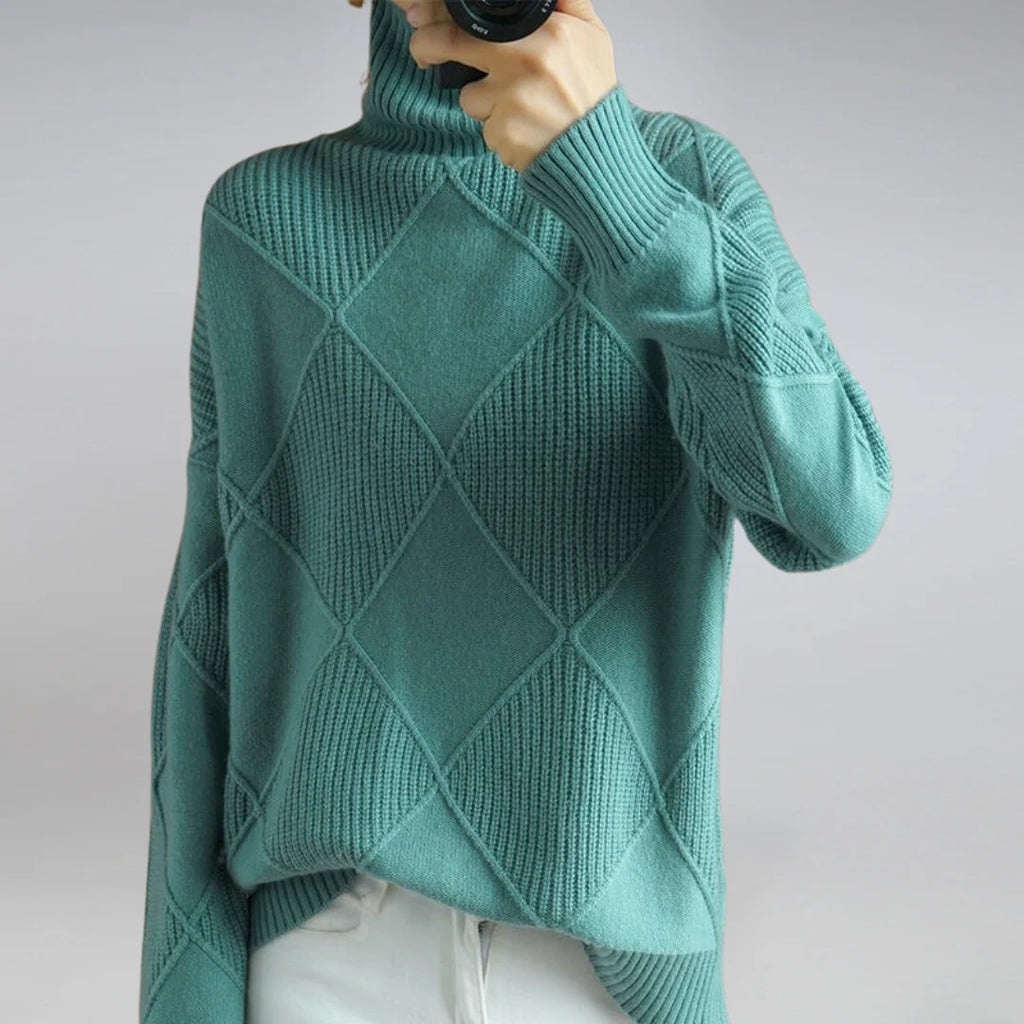 Women's turtleneck jumper in black with high neck and drop shoulders for comfortable layering