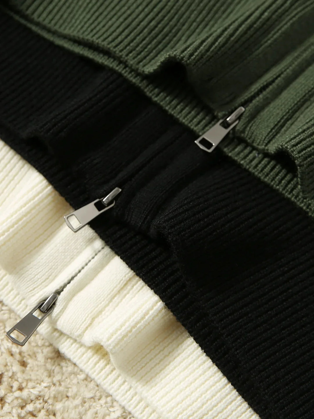 Detail shot of relaxed tailored fit and ribbed knit construction