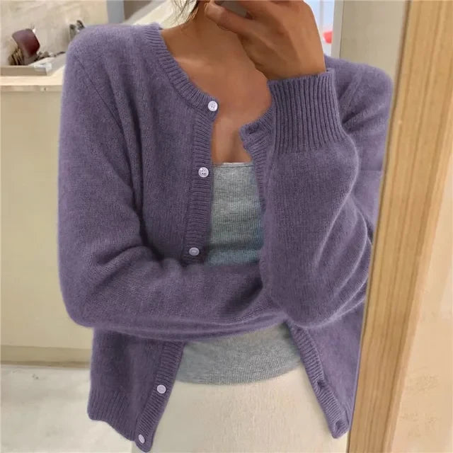 Women's grey knit cardigan styled open over fitted top for casual layering look